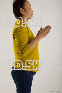 Arm flexing reference of yellow sweater blue jeans Gwendolyn 0014